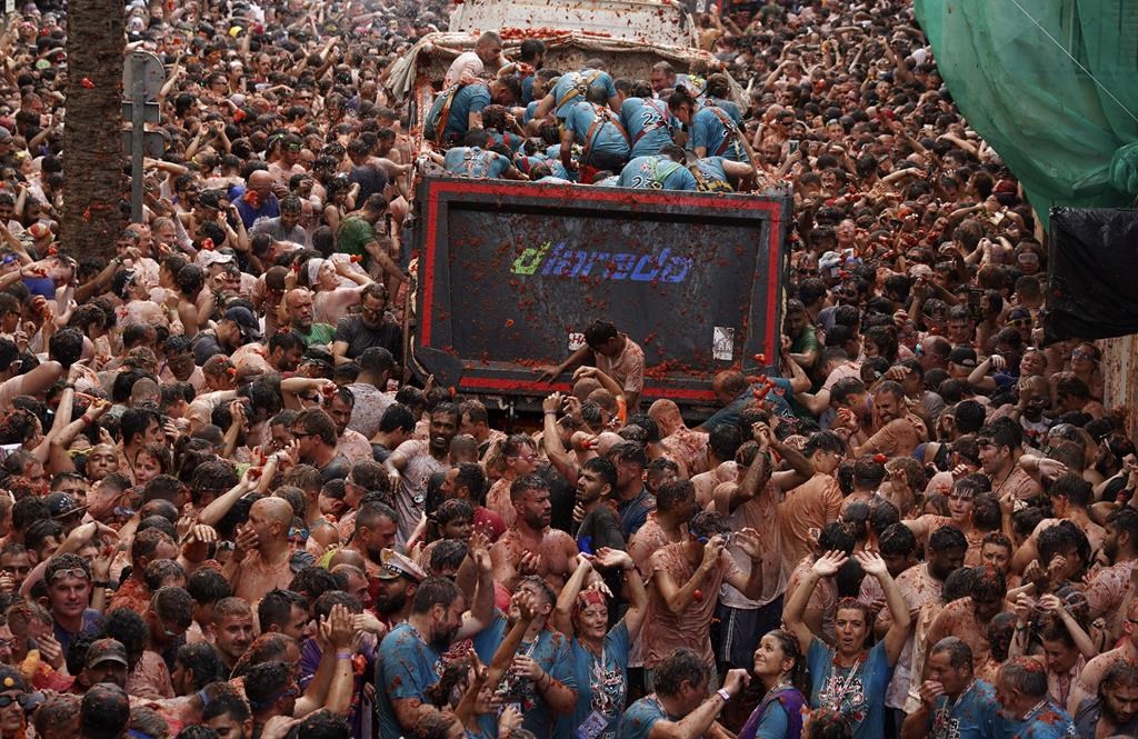 Revelers Hurl Tomatoes At Each Other And Streets Awash In Red Pulp In