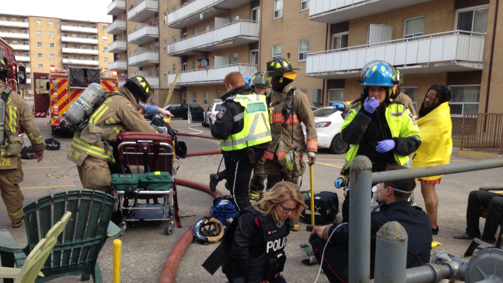 Paramedics at the scene following an apartment fire on Lake Promenade, near Long Branch Avenue, on March 31, 2015. CITYNEWS/Bryan Carey