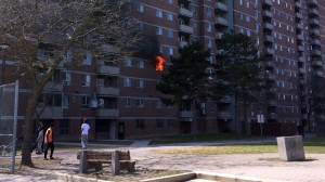 Flames shoot out of the window of an apartment in North York on April 25, 2015. HANDOUT/Manh Nguyen