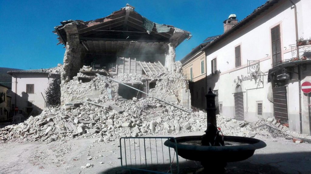 The Church of San Francesco is covered with dust and rubble, in Norcia, central Italy, after an earthquake with a preliminary magnitude of 6.6 struck Sunday, Oct. 30, 2016. A powerful earthquake rocked the same area of central and southern Italy hit by quake in August and a pair of aftershocks last week, sending already quake-damaged buildings crumbling after a week of temblors that have left thousands homeless. (Matteo Guidelli/ANSA via AP)