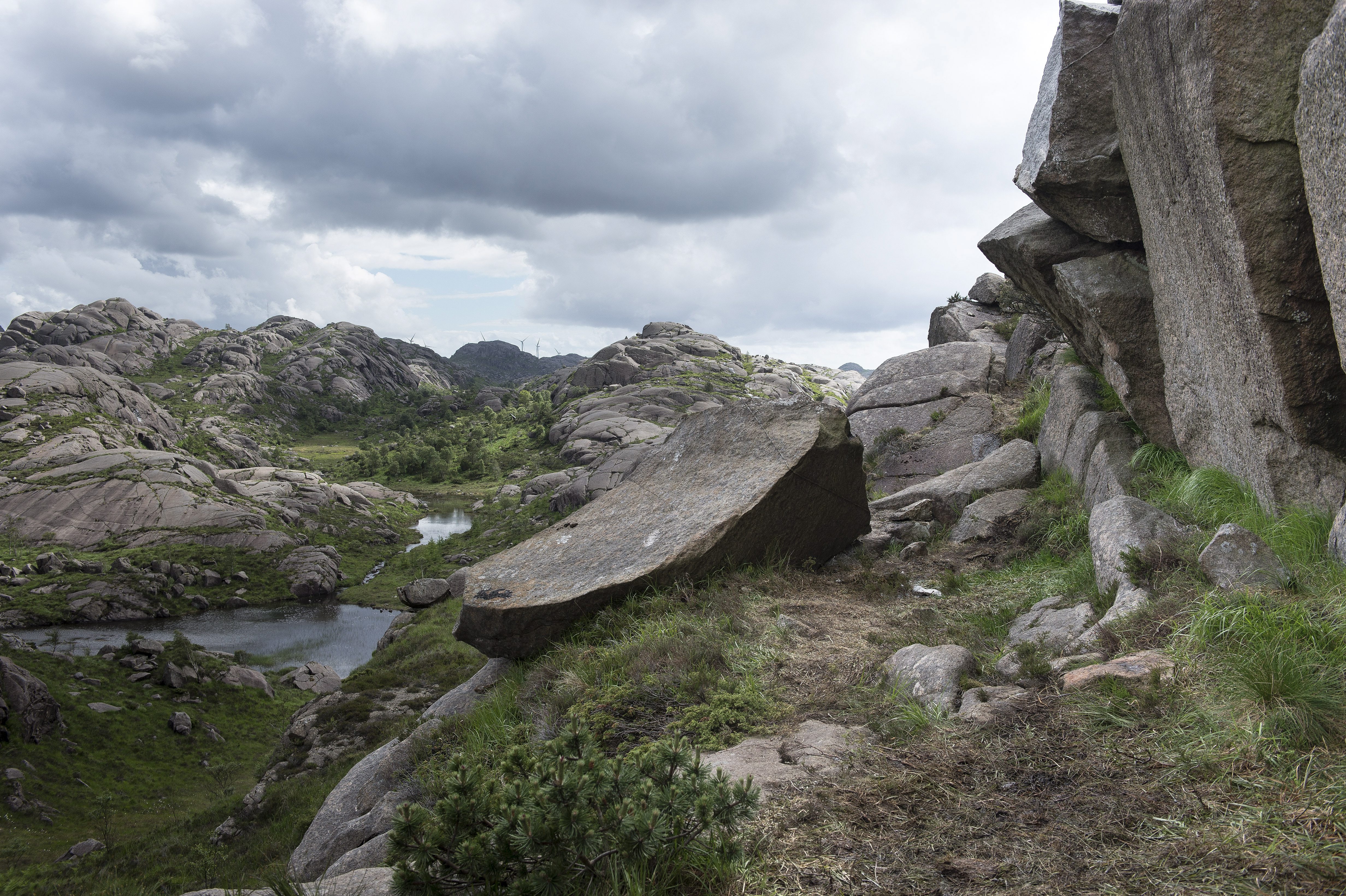 The damaged rock formation Trollpikken in Egersund, western Norway, Saturday June 24, 2017. A group of activists have started to collect money to repair the penis-shaped rock formation and a popular tourist attraction after it was found badly damaged Saturday June 24, 2017. It was discovered cracked complete with drilling holes in the rock - something that experts say suggests strongly that it was cut off on purpose. (Carina Johansen/NTB Scanpix via AP)