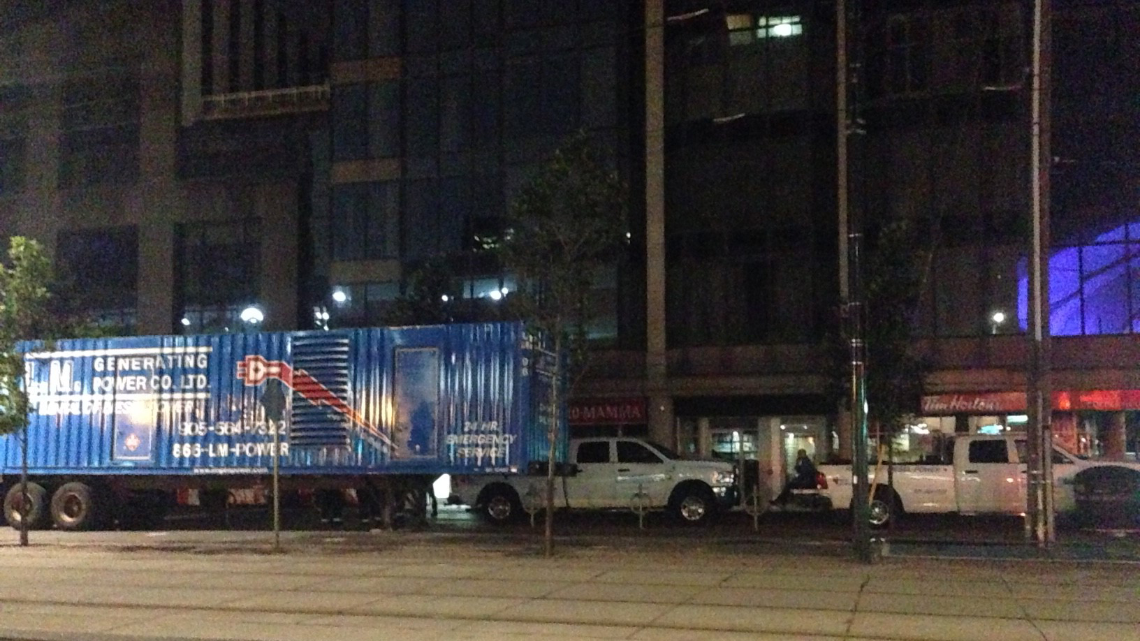 A generator is seen outside CityPlace during a power outage on July 12, 2017. CITYNEWS/Bertram Dandy 