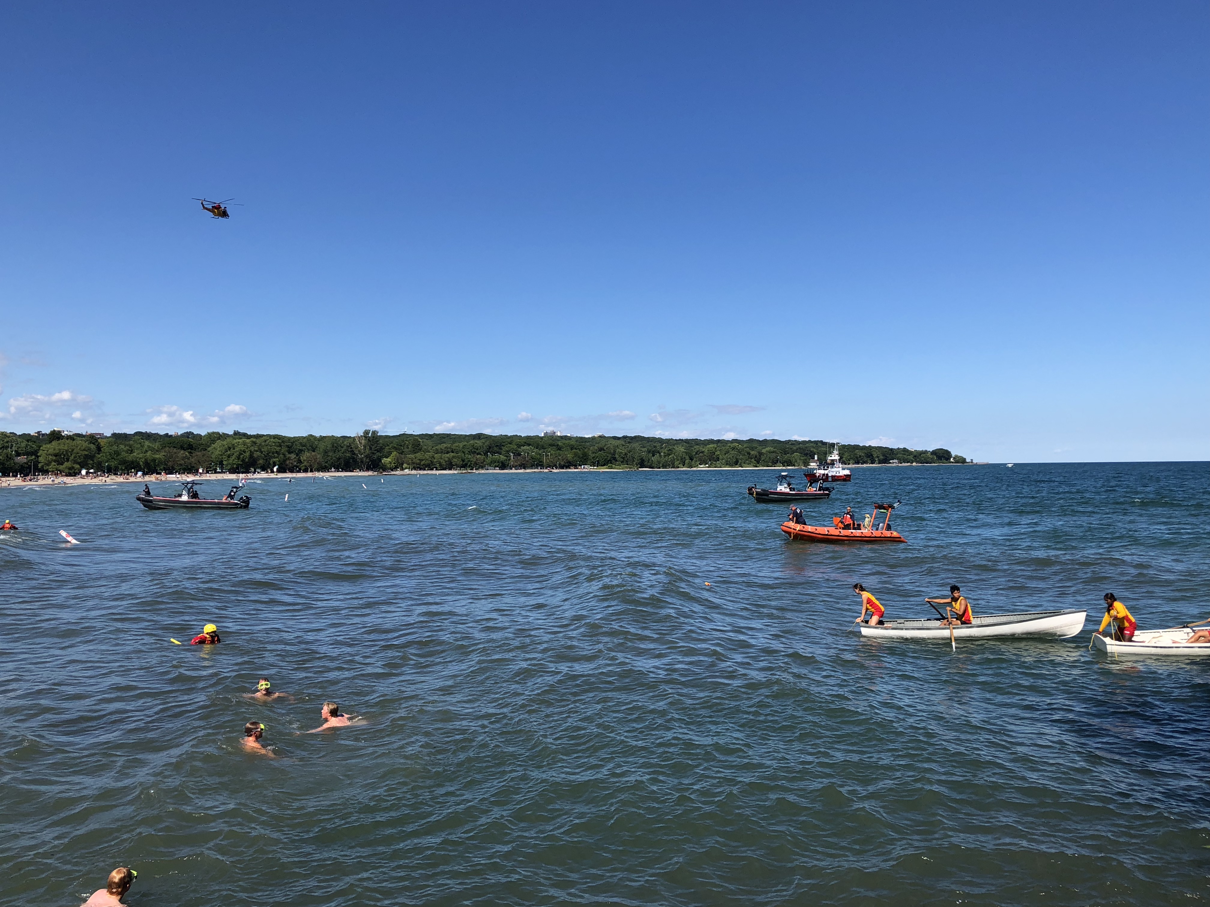 Rescue boats are seen in Lake Ontario during a rescue off Woodbine Beach on Aug. 10, 2018. CITYNEWS/John Hanley