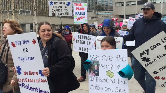 Hundreds march to Queen's Park to protest autism funding changes