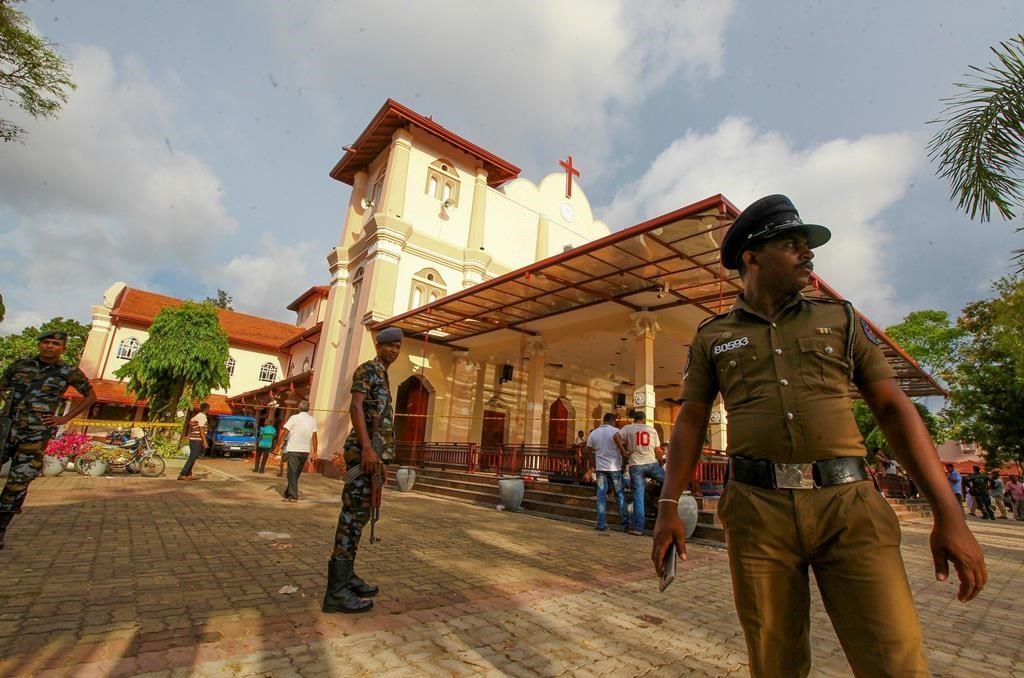 Sri Lankan army soldiers outside St. Sebastian's Church