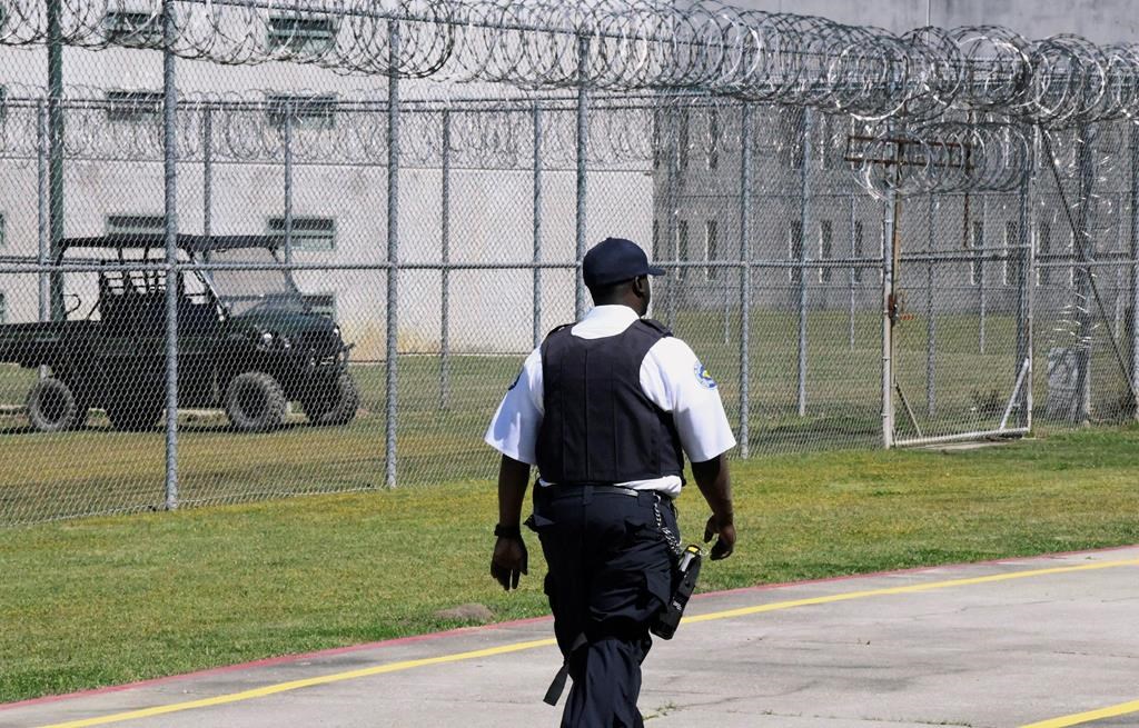Prison staff work at Lee Correctional Institution on Wednesday, April 10, 2...