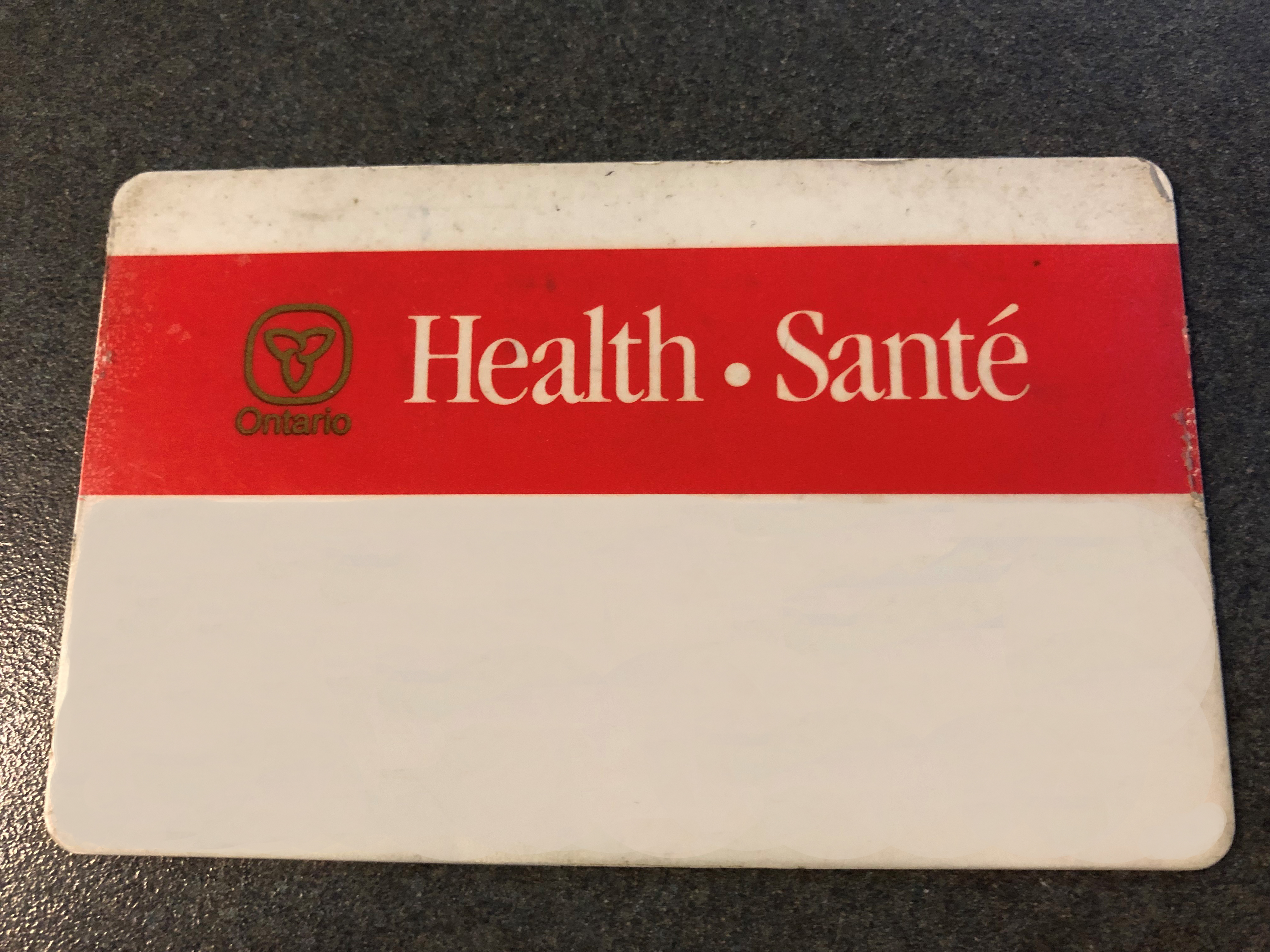 ontario-sets-official-end-date-of-july-1-for-red-and-white-health-cards