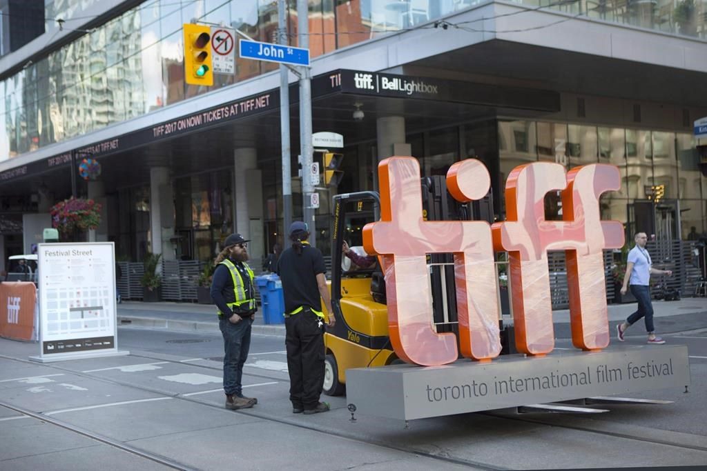 A sign bearing the Toronto International Film Festival logo sits on a fork lift as preparations are made for the festival's opening night on Sept. 7, 2017