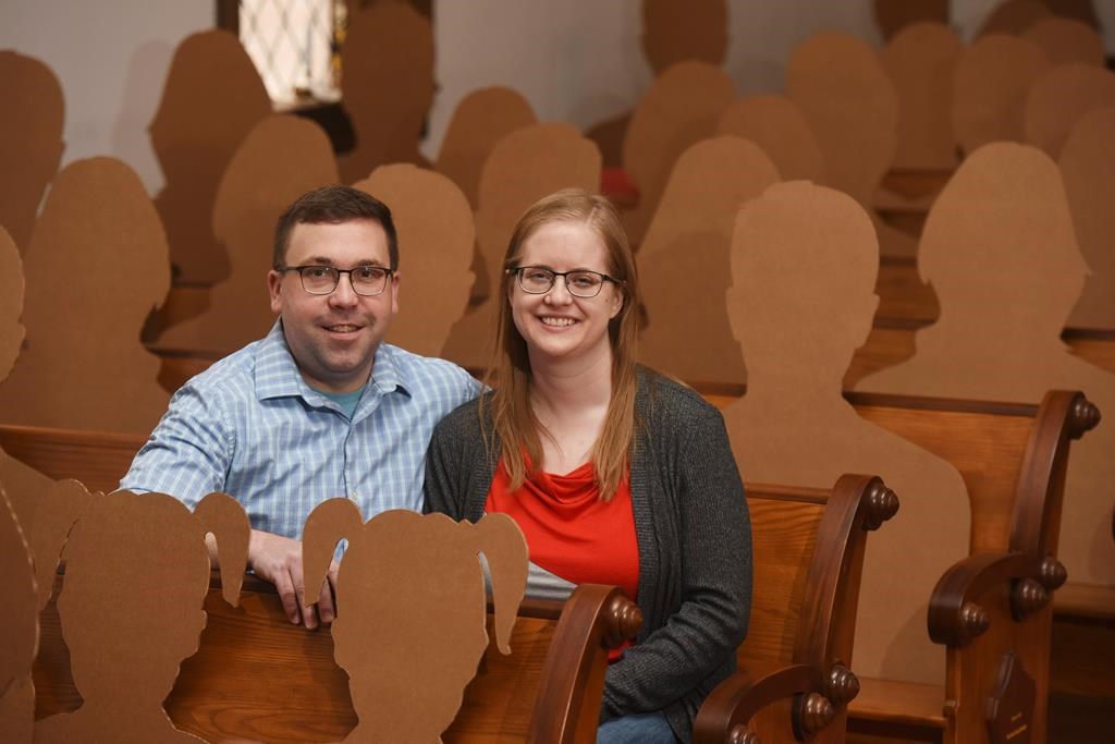 Cardboard cutouts pose as guests for wedding amid COVID19