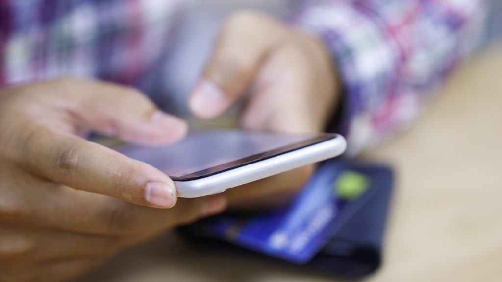 A man using his cellphone