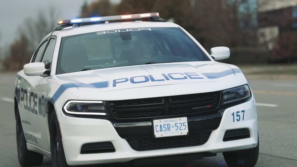 A picture of a Peel Regional Police vehicle on a road