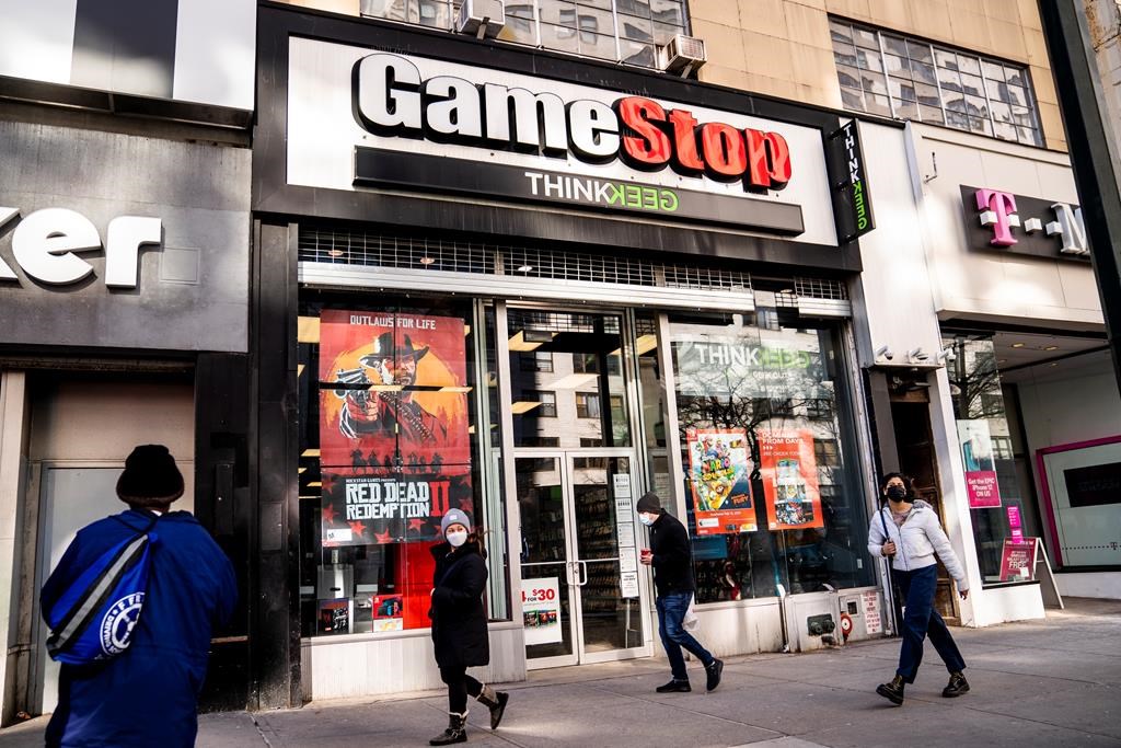 Brokerages limit trading in GameStop, sparking outcry