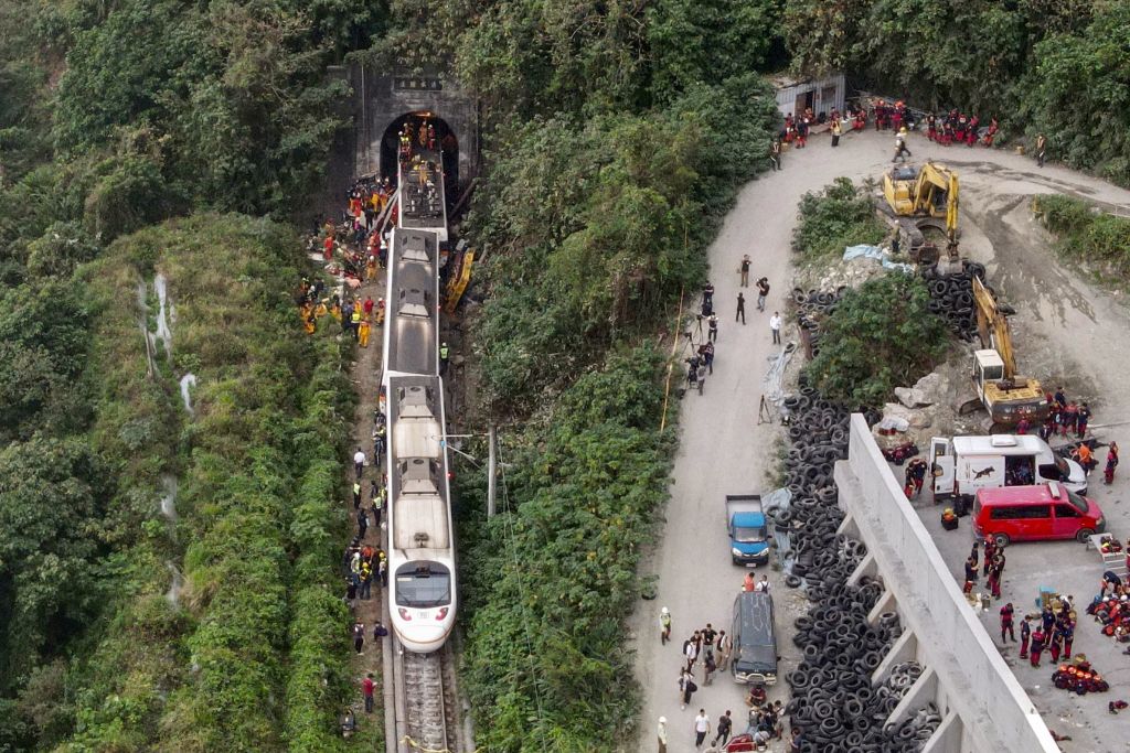 Truck knocks train off tracks in Taiwan, killing at least 48