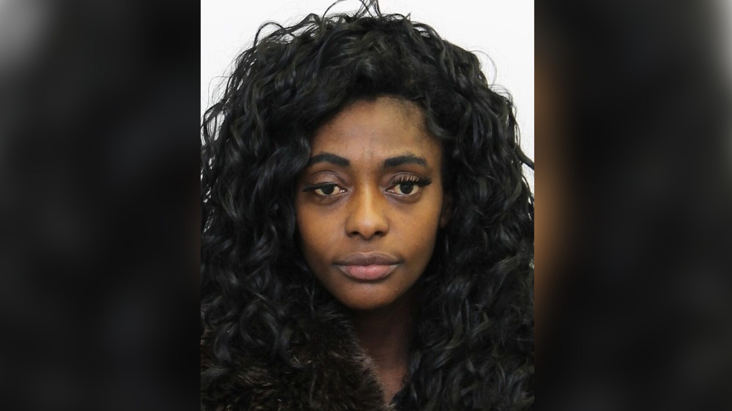 Woman charged with murder after body found in suitcase Toronto police