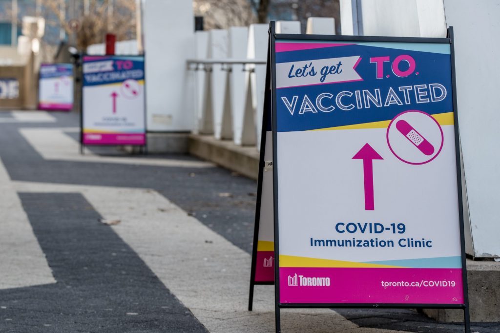 A sign seen outside the Metro Convention Centre vaccination centre in Toronto.