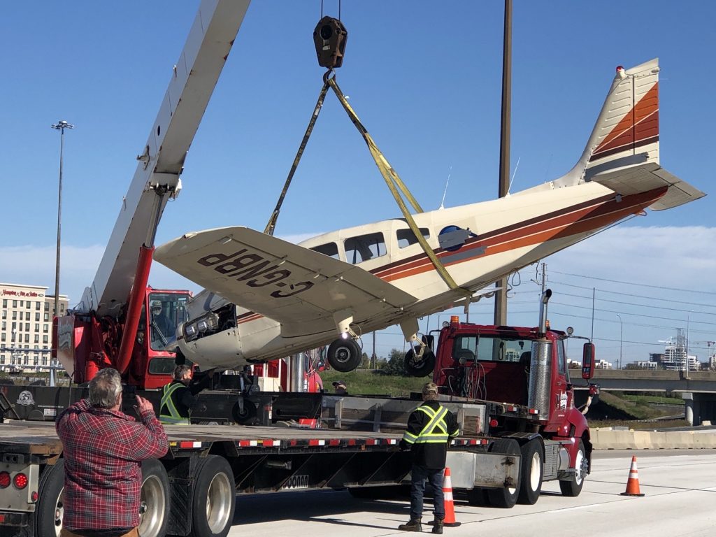 Crane lifts plane off highway 407
