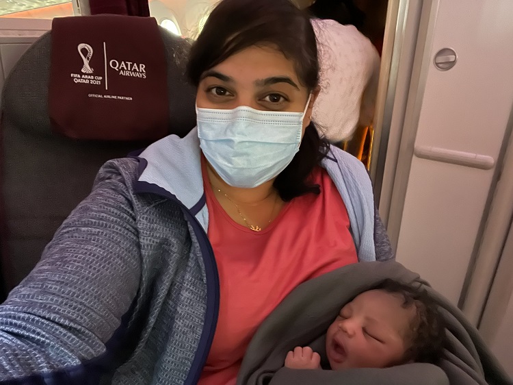 Dr. Aisha Khatib with the baby she delivered on a Qatar Airways flight. 