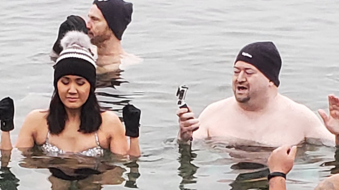 Hundreds plunge into frigid waters of Lake Ontario in Toronto to celebrate  resilience