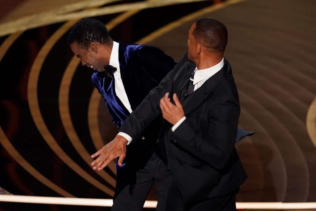 Will Smith slaps presenter Chris Rock on stage