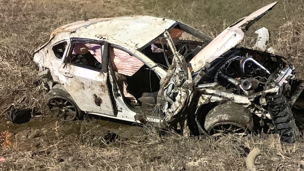 Wreckage of car involved in a single-vehicle crash on Highway 427