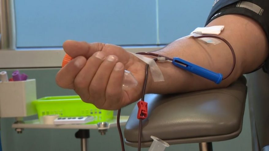 A person donating blood