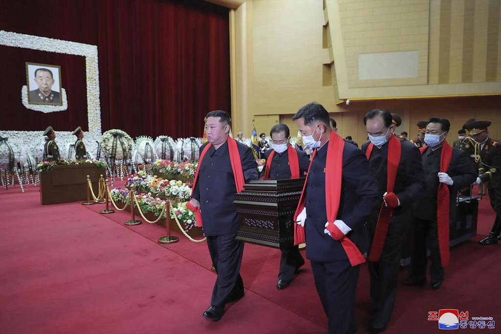 Kim, Other N. Koreans Attend Large Funeral Amid COVID Worry