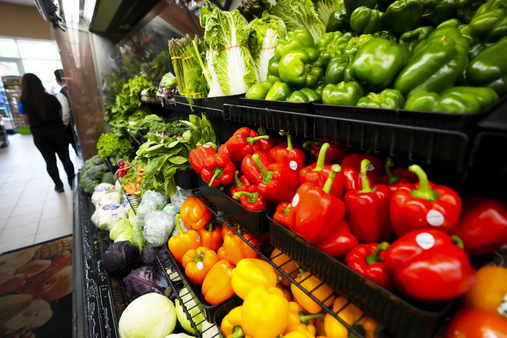 Produce vegetables are displayed for sale at a grocery store on May 26, 2022