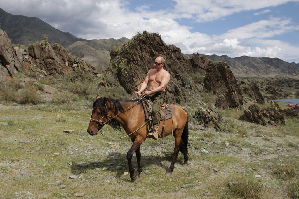 Then-Prime Minister of Russia Vladimir Putin ia seen riding a horse while traveling in the mountains of the Siberian Tyva region (also referred to as Tuva), Russia, during his short vacation. G7 leaders gathering in Germany to discuss increasing the pressure on Vladimir Putin over the war in Ukraine are also taking aim at the Russian president's penchant for taking off his shirt.