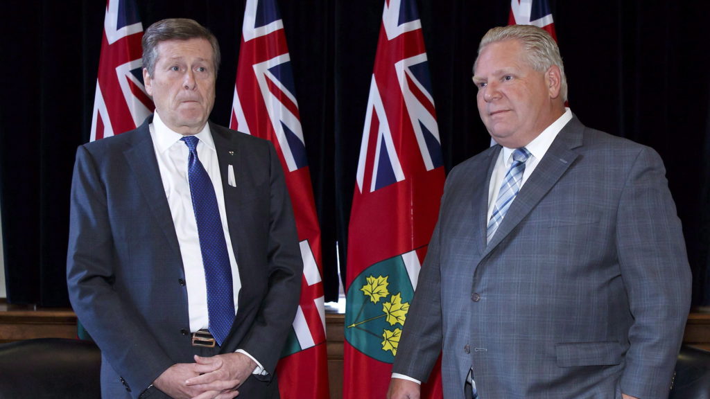 Toronto Mayor John Tory, left, and Ontario Premier Doug Ford stand for a photo opp in Ford's Queen's Park office in Toronto on December 6, 2018.