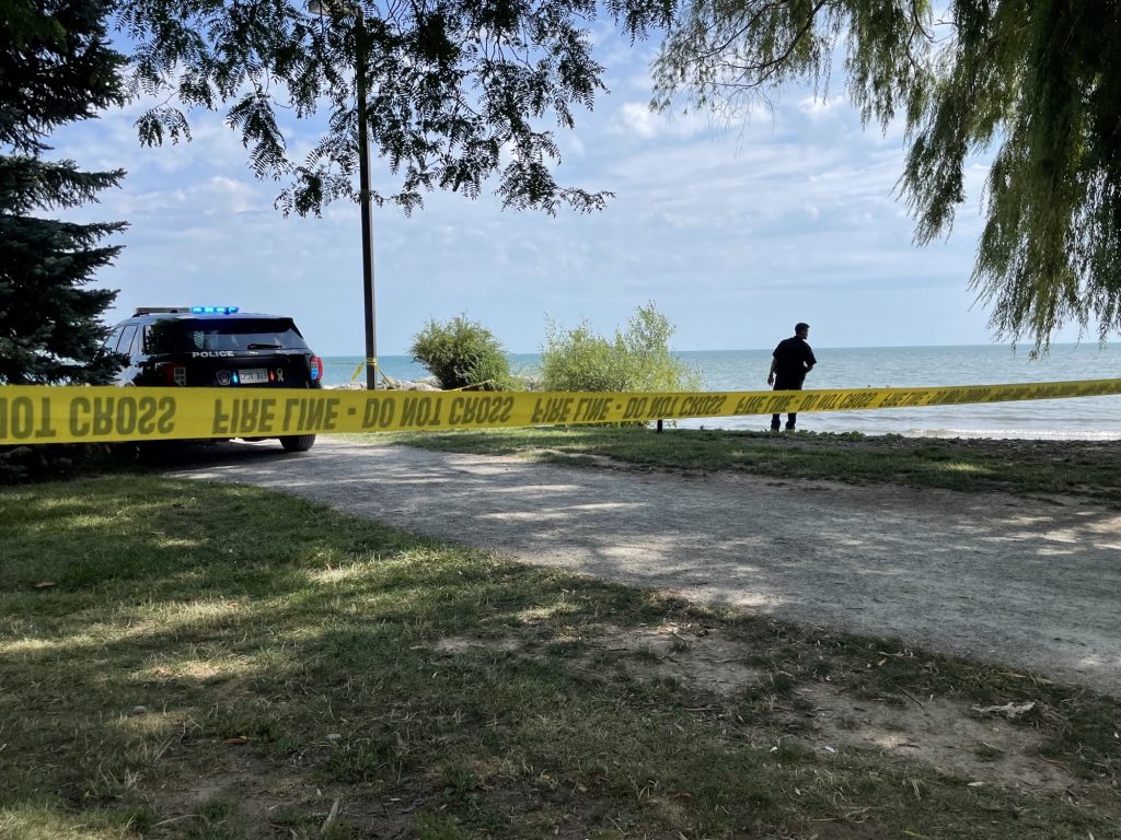 Police are on the scene at Coronation Park beach after a woman and boy were pulled from the water.