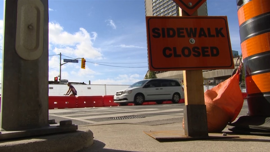 Crosswalk closed at Queens Quay near Yonge Street