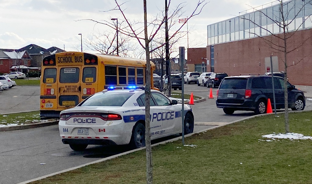 Peel police at Castlebrooke Secondary School in Brampton after a shooting at one of the school's parking lots on Nov. 18, 2022.