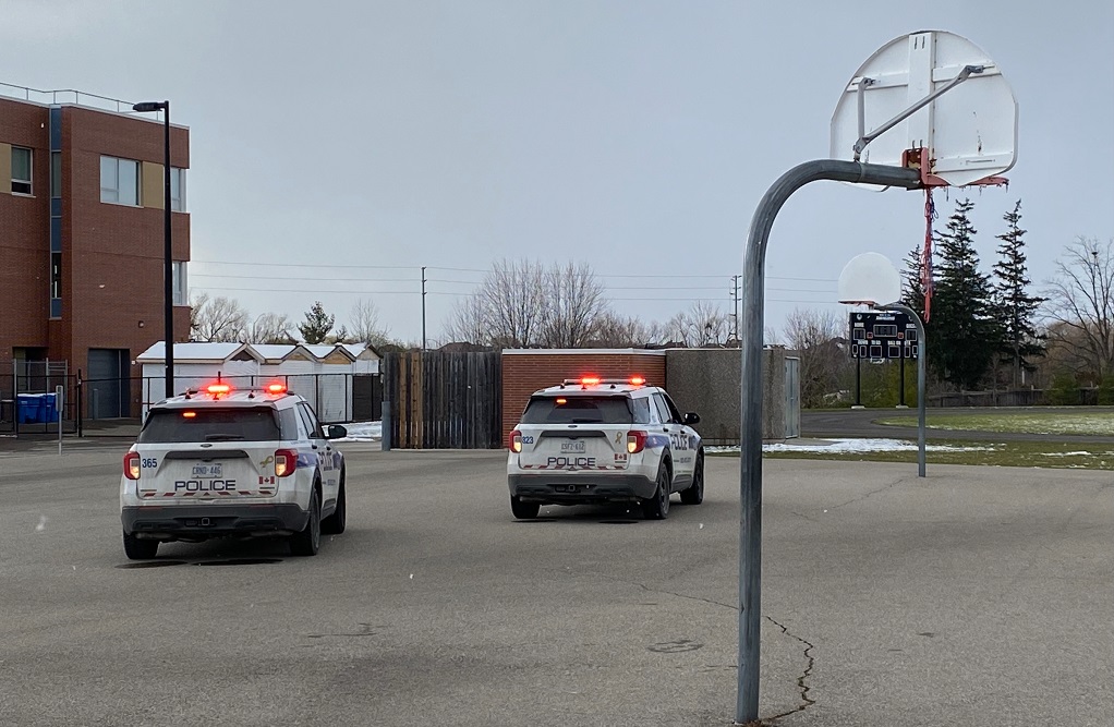 Peel police at Castlebrooke Secondary School in Brampton after a shooting at one of the school's parking lots on Nov. 18, 2022.