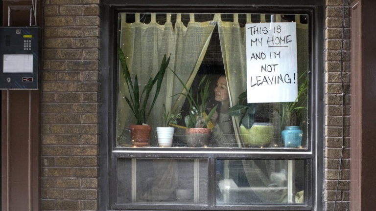 A tenant protesting a possible eviction.