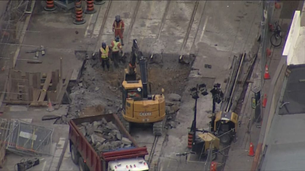 An emergency closure of Dundas Street West in Toronto for repairs to a sinkhole discovered under the streetcar tracks as seen from Chopper 680 on Nov. 28, 2022.