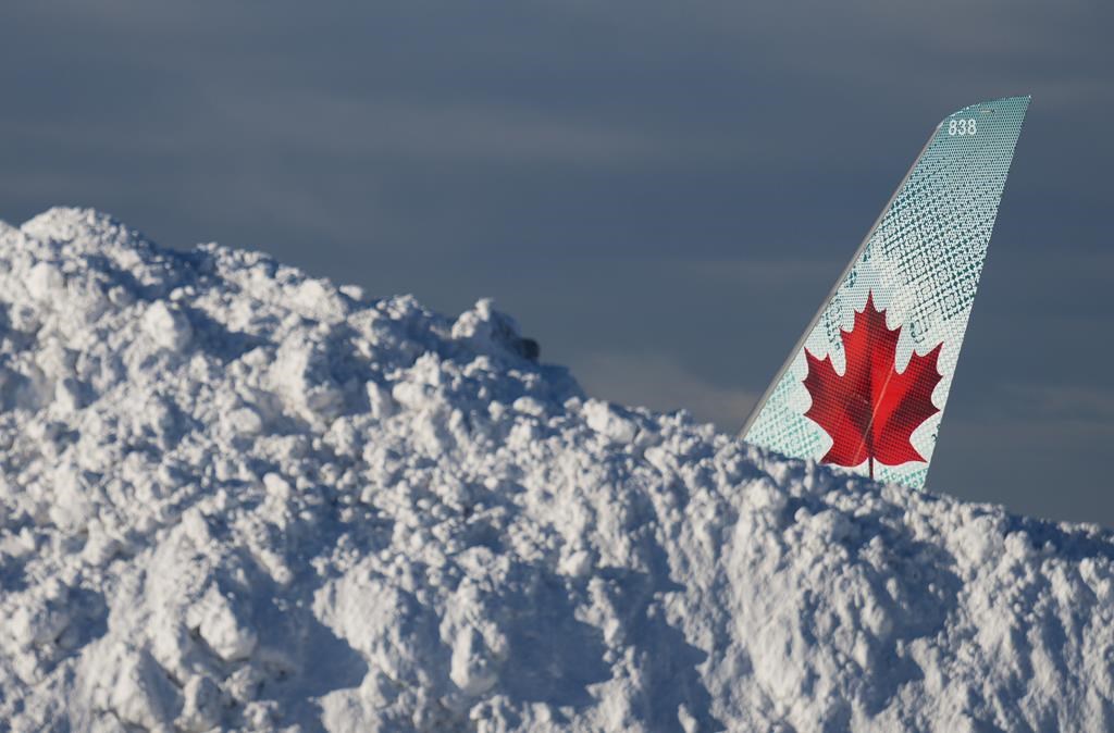 Wintry woes put Canadian holiday travel on ice, as airports brace for another blast