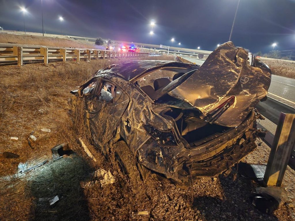 A vehicle totalled in a single car crash on Highway 403 that injured a 24-year-old woman.