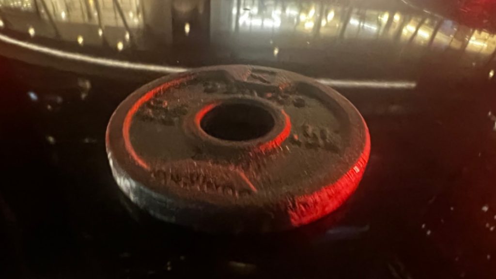 Weight plate lands on vehicle in downtown Toronto, police investigating
