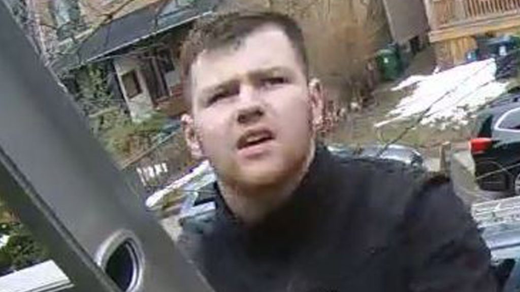Surveillance image of a man who claimed to be a roofer
