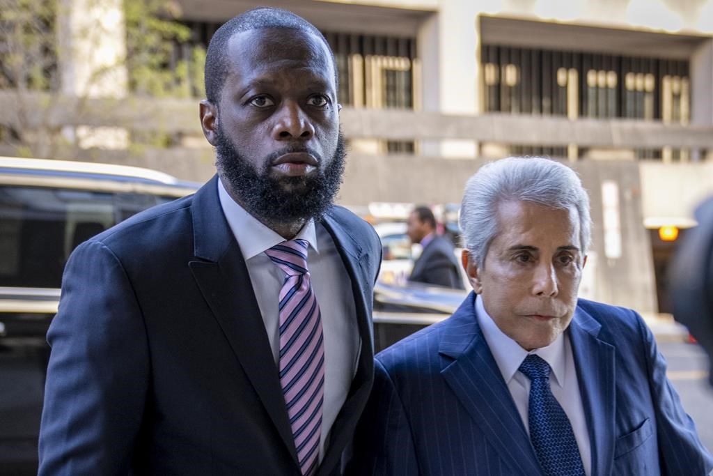 Fugees rapper in political conspiracy trial launches defense