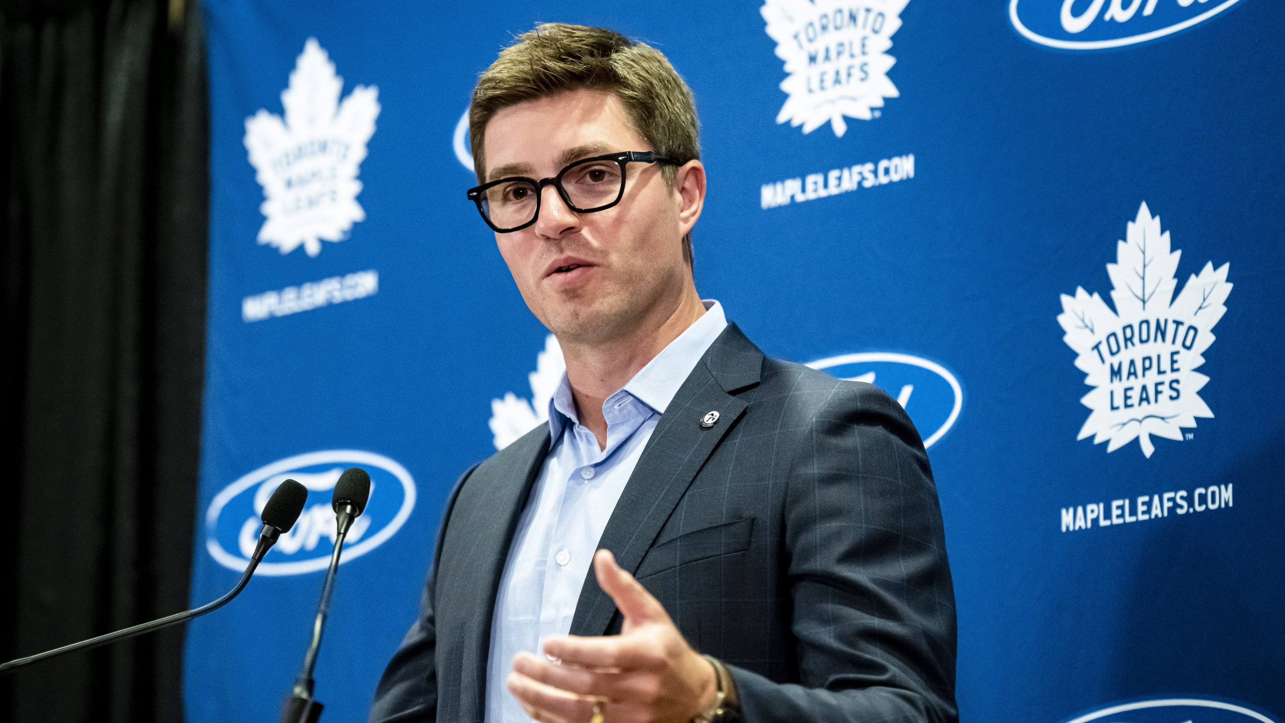 Kyle Dubas speaks at a press conference as he's introduced as the new  general manager of the Toronto Maple Leafs in Toronto on Friday, May 11,  2018. Members of the Toronto Maple