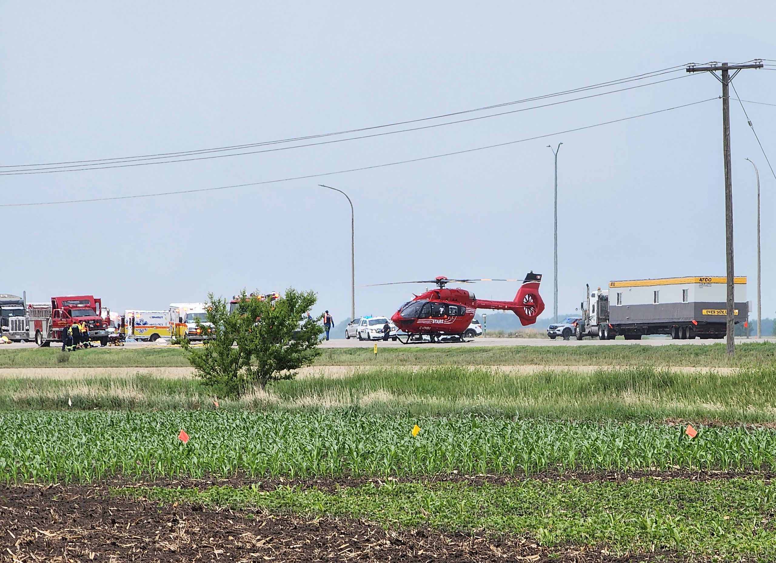 A crash, as shown in this handout image provided by Nirmesh Vadera, has closed a section of the Trans-Canada Highway near Carberry, Manitoba on Thursday June 15, 2023.