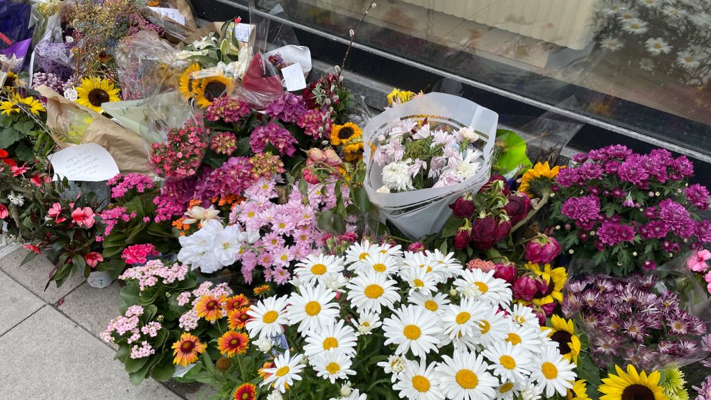 Leslieville memorial of flowers and cards