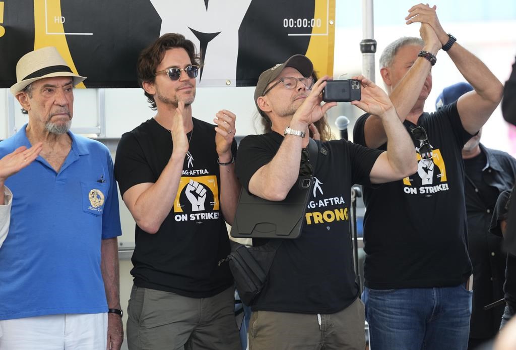 Bryan Cranston, Jessica Chastain join star-studded Times Square rally ...