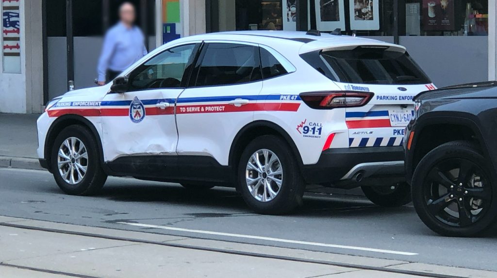 A parking enforcement vehicle was involved in a crash with another vehicle in downtown Toronto