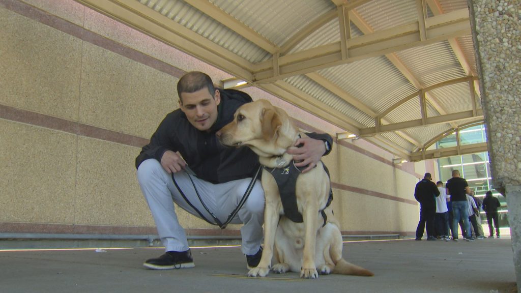 Ryan Hooey and his guide dog Joe