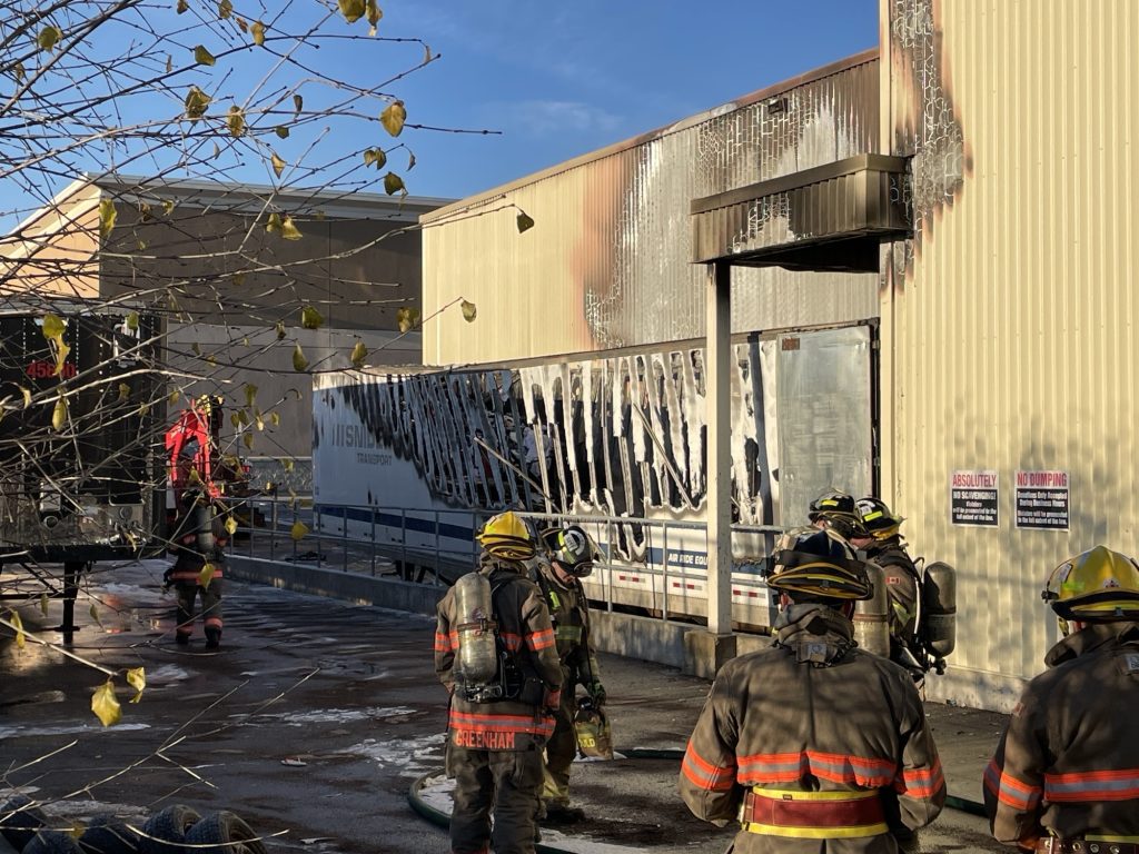 A tractor trailer catches fire at a parking lot plaza in Brampton on November 20, 2023.