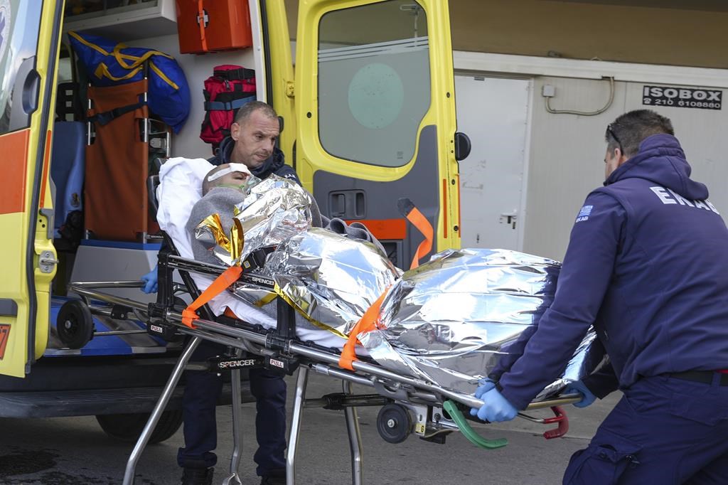 12 crew members are missing, 1 dead after a cargo ship sinks off a Greek island in stormy seas