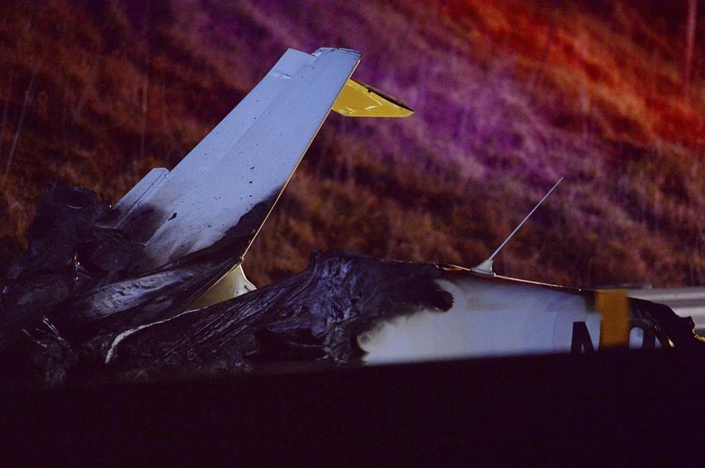 A plane hit powerlines over I 26 in North Carolina and burst into