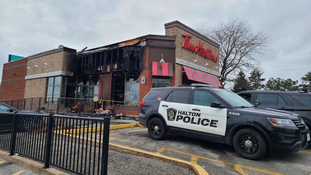 A dumpster fire spread to a Tim Hortons at Brant Street and Upper Middle Road in Burlington on Dec. 21, 2023